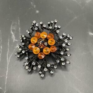Amber and diamond rhinestone scatter sunburst brooch large vintage black metal
